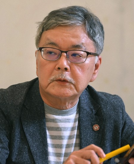 与良正男