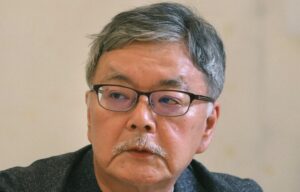 与良正男